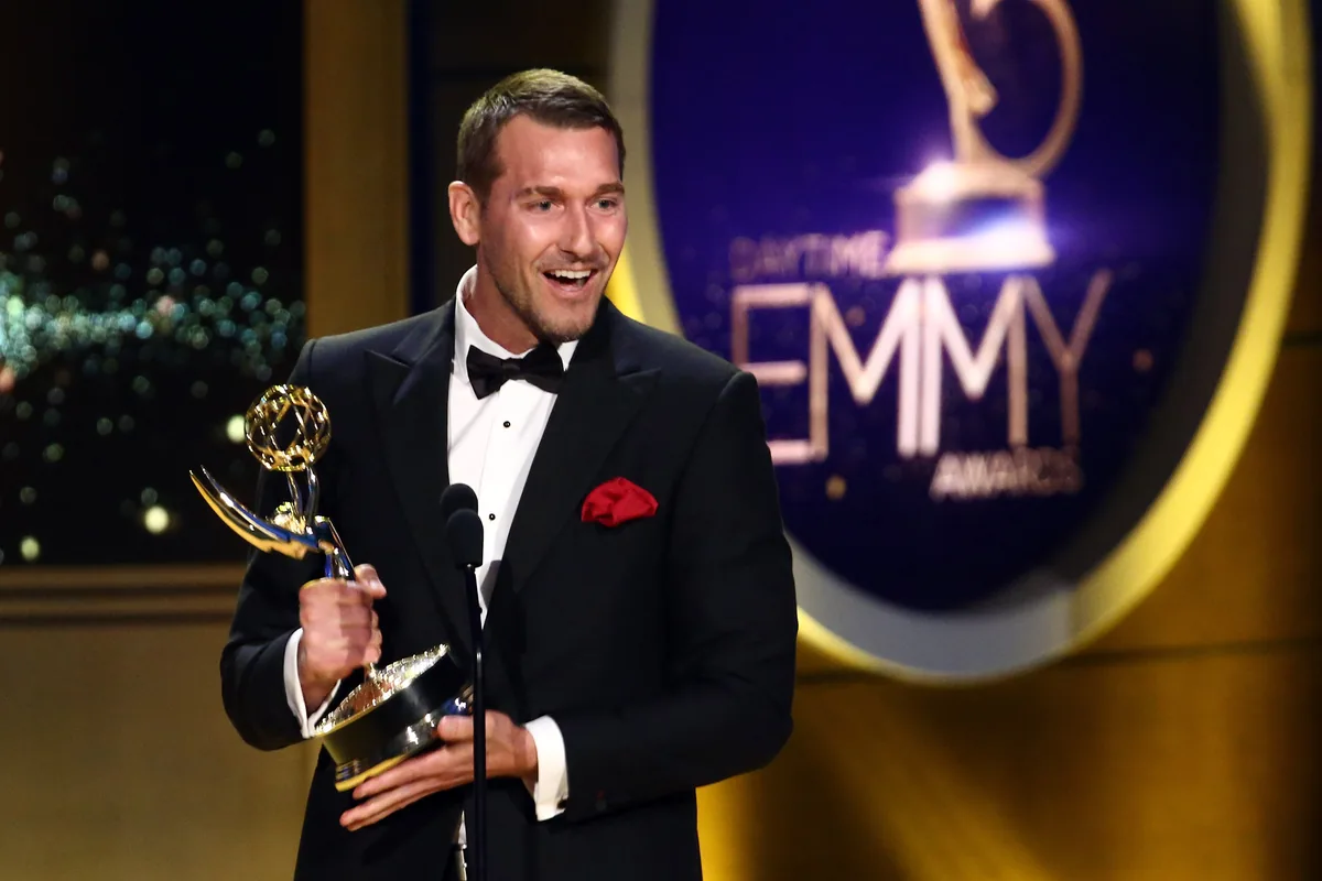 Brandon McMillan accepting a Daytime Emmy Award on stage