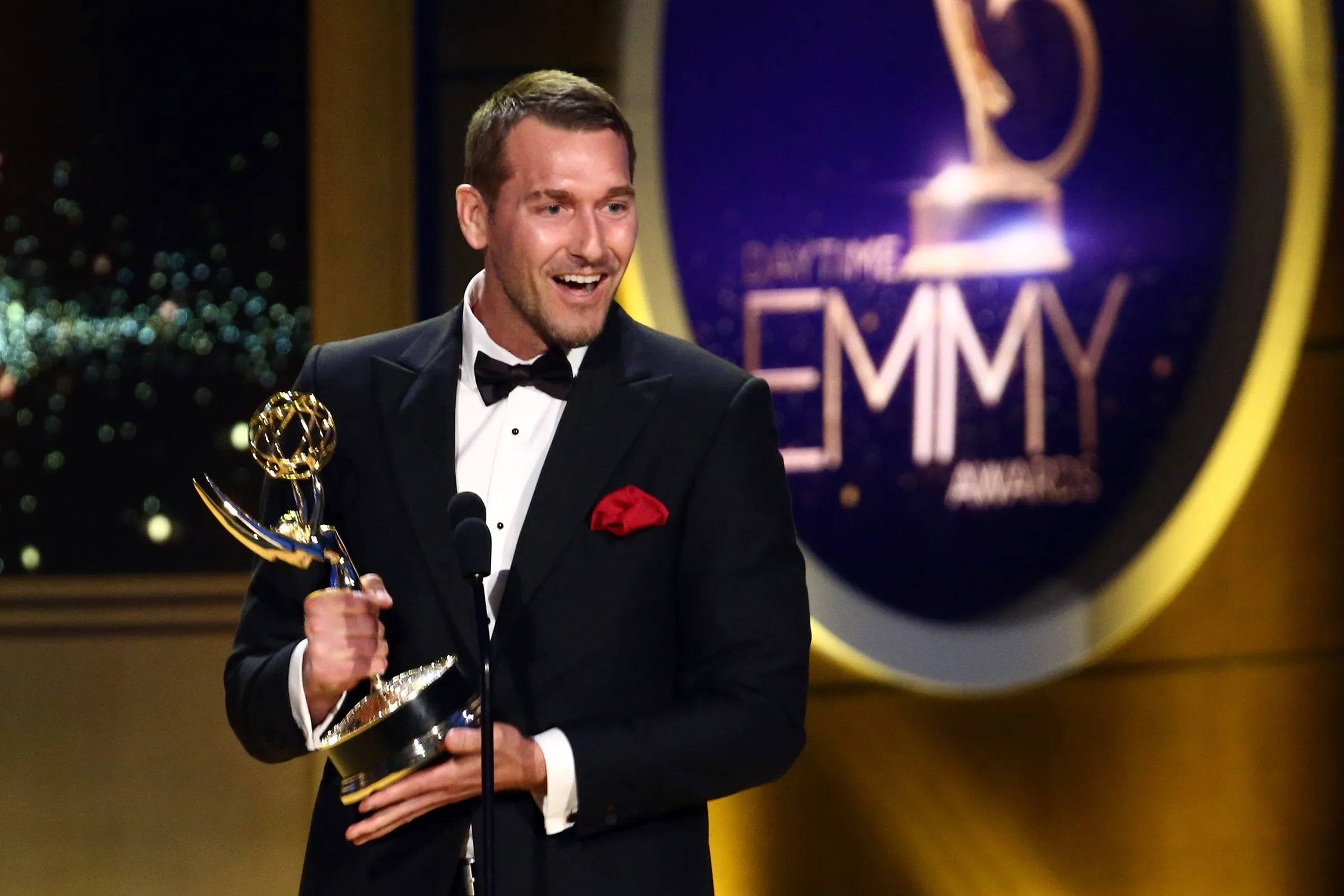 Brandon McMillan accepting a Daytime Emmy Award on stage