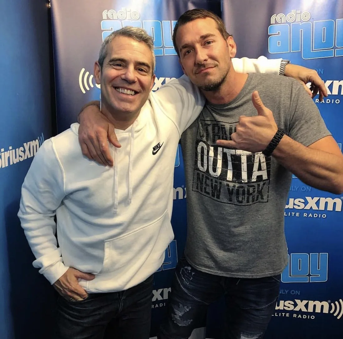 Brandon McMillan and Andy Cohen at a radio studio